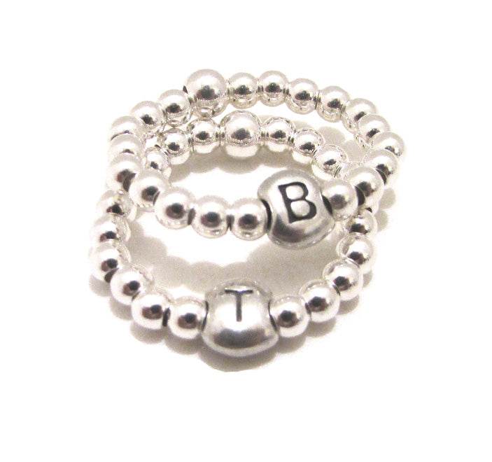 Anello elastico letterina - SPAN36 - Spadarella Gioielli