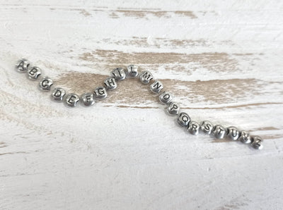 Anello elastico letterina - SPAN36 - Spadarella Gioielli